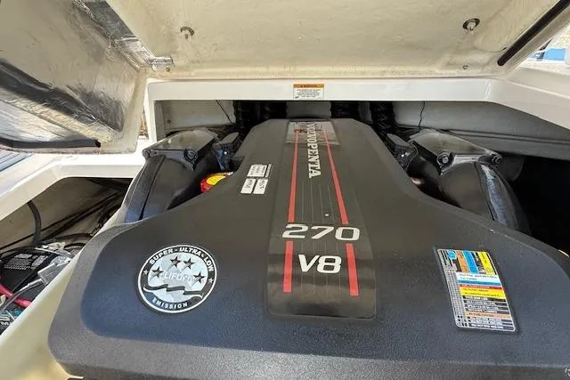 Slide: The Image of Engine compartment of a 2012 Regal 2000 Bowrider featuring a 270 V8 engine. - 19