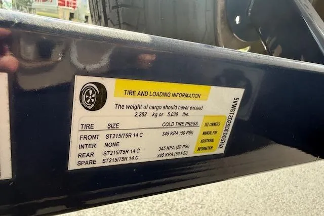 Slide: The Image of Tire and loading information label on a 2012 Regal 2000 Bowrider trailer. - 32