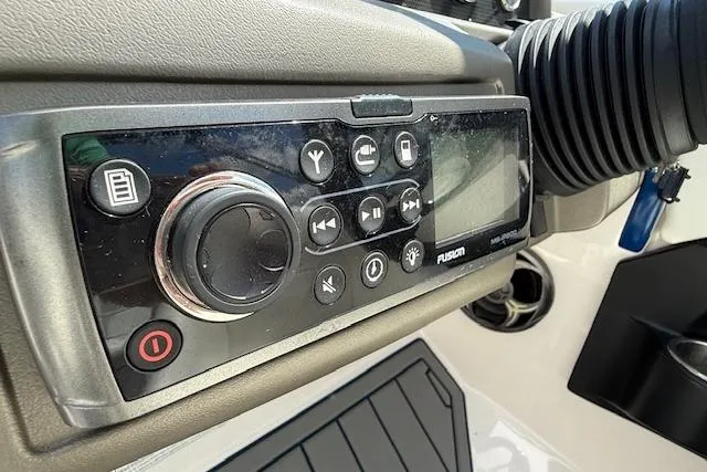 Slide: The Image of Control panel of a 2012 Regal 2000 Bowrider boat with Fusion audio system. - 7