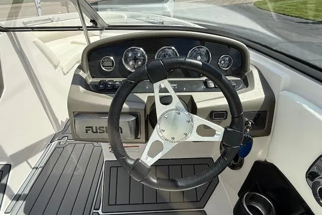 Slide: The Image of Steering wheel and dashboard of a 2012 Regal 2000 Bowrider boat. - 8