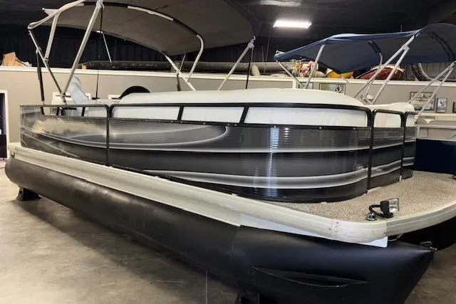 Slide: The Image of 2002 Aqua Patio AP 220 R pontoon boat in indoor storage. - 2