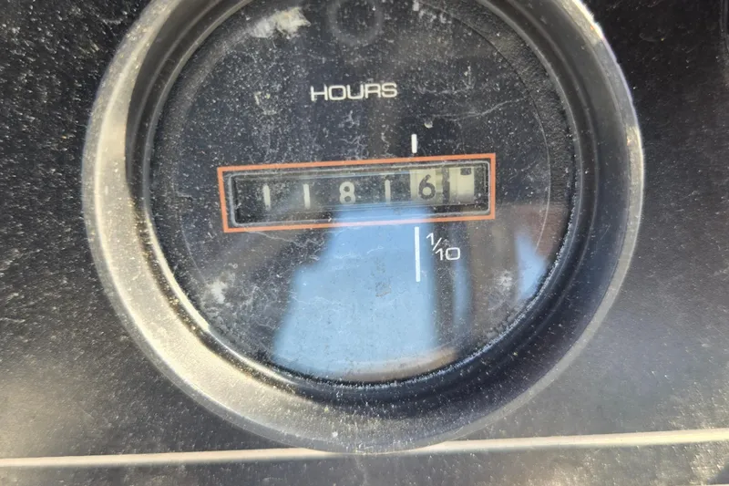 Slide: The Image of Hour meter showing 1186.1 hours on a 1987 Silverton 34C boat. - 28