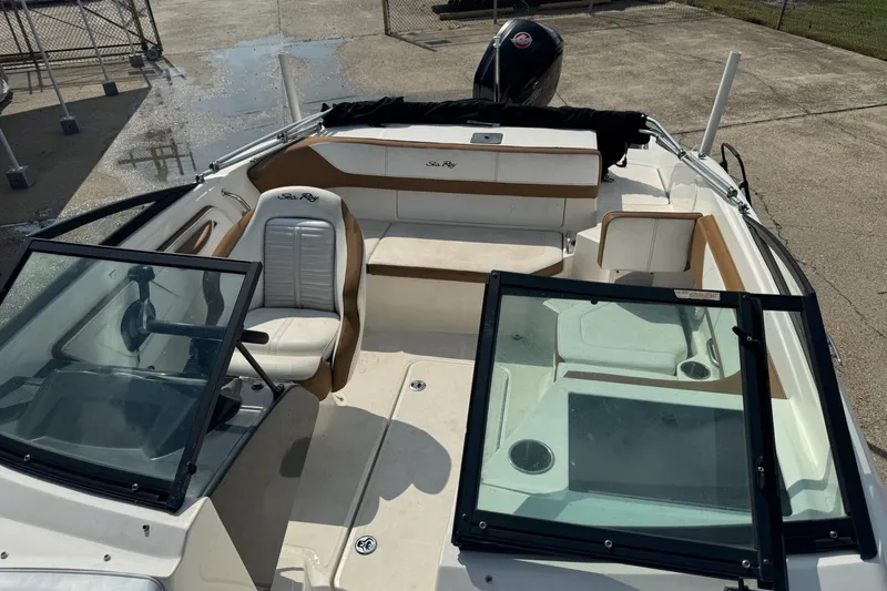 Slide: The Image of 2017 Sea Ray SPX 190 Outboard boat interior with steering wheel and captain's seat. - 12