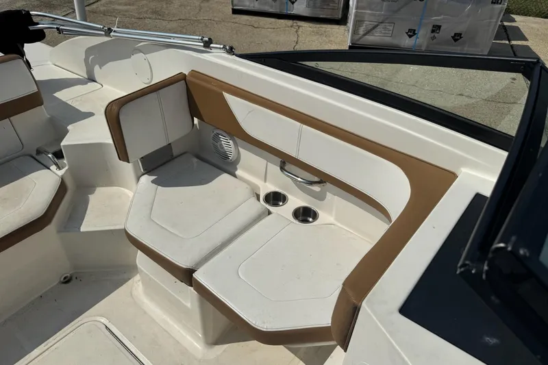Slide: The Image of 2017 Sea Ray SPX 190 Outboard boat interior with seating and storage compartments. - 14