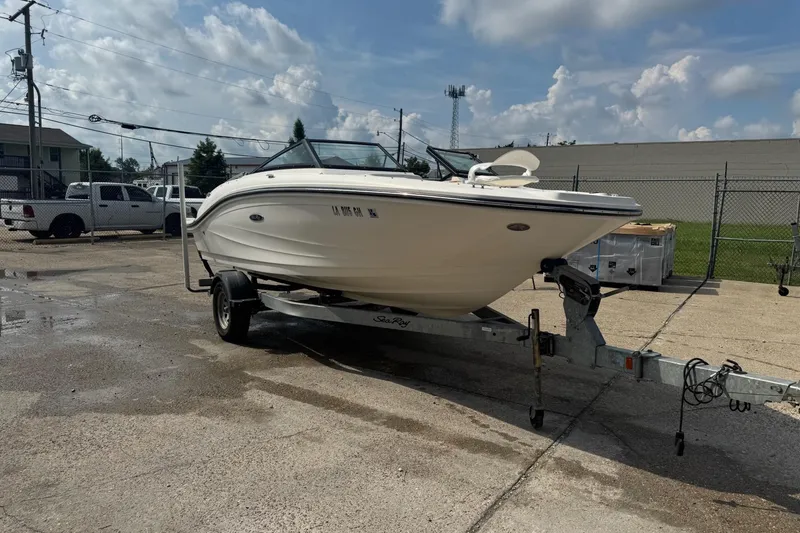 Slide: The Image of 2017 Sea Ray SPX 190 Outboard boat on trailer, parked outdoors. - 3