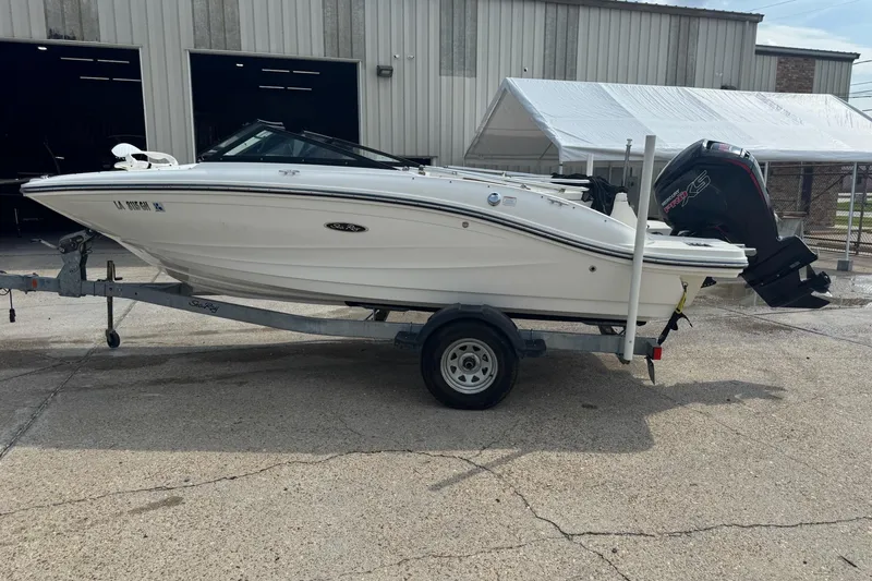 Slide: The Image of 2017 Sea Ray SPX 190 Outboard boat, aerial view, docked on concrete surface. - 8