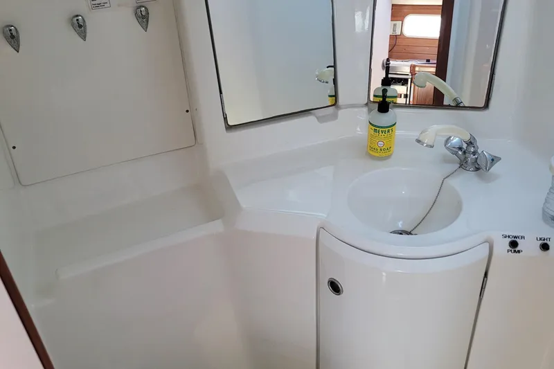 Slide: The Image of Bathroom interior of 1999 Beneteau Oceanis 351 yacht with sink and mirror. - 40