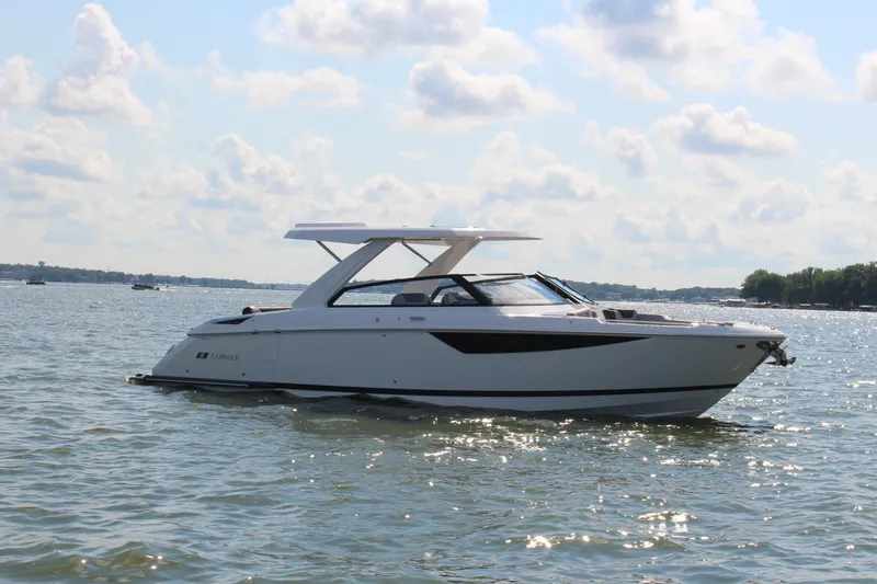 The Image of 2025 Cobalt R35 boat on a sunny lake, showcasing sleek design and modern features. - 0