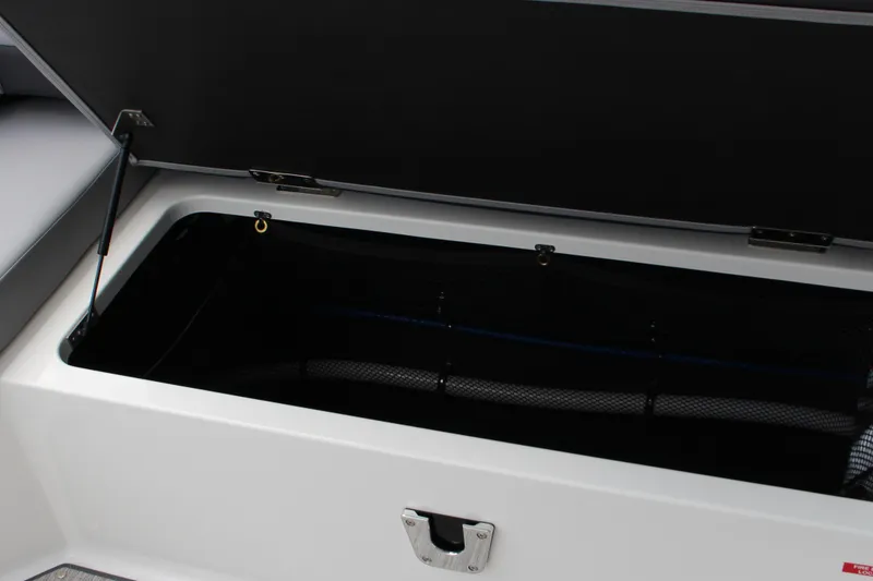 Slide: The Image of Open storage compartment in 2025 Cobalt R35 boat. - 14