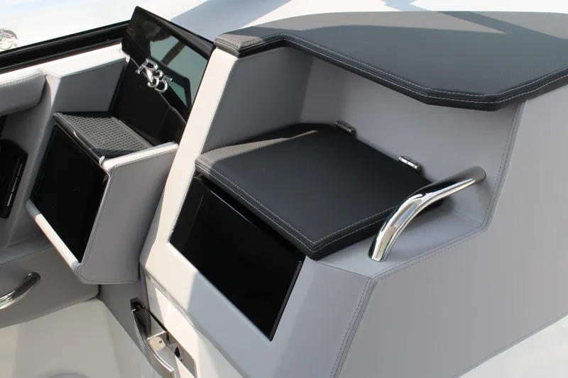 Slide: The Image of Interior of 2025 Cobalt R35 boat with sleek, modern design and storage compartments. - 20