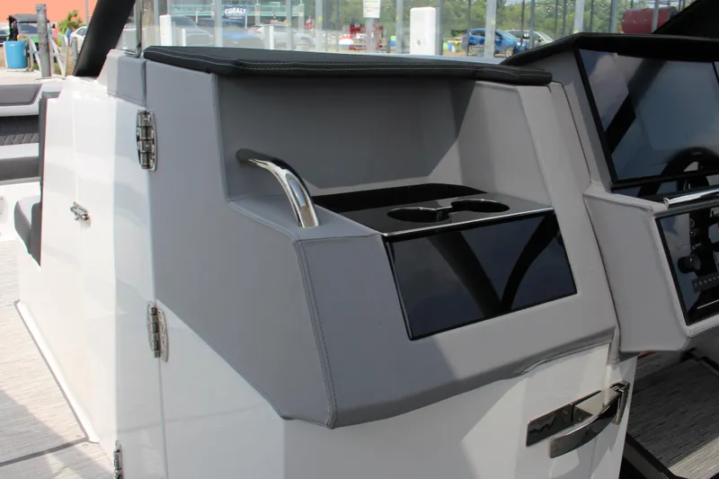 Slide: The Image of Interior of 2025 Cobalt R35 boat featuring sleek design and modern controls. - 22