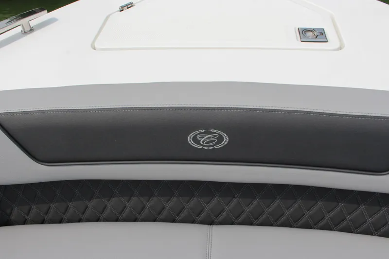 Slide: The Image of 2025 Cobalt R35 boat interior with elegant quilted leather seating and embroidered logo. - 26