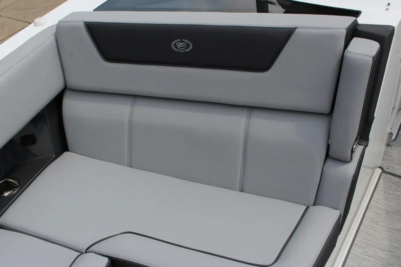 Slide: The Image of 2025 Cobalt R35 boat interior with sleek gray seating and black accents. - 29