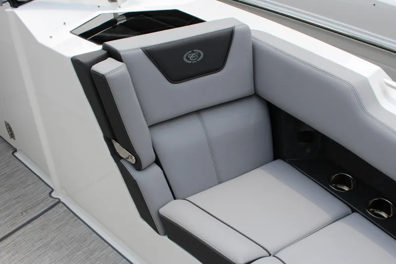 Slide: The Image of Luxury seating in 2025 Cobalt R35 boat, featuring sleek gray upholstery and cup holders. - 30
