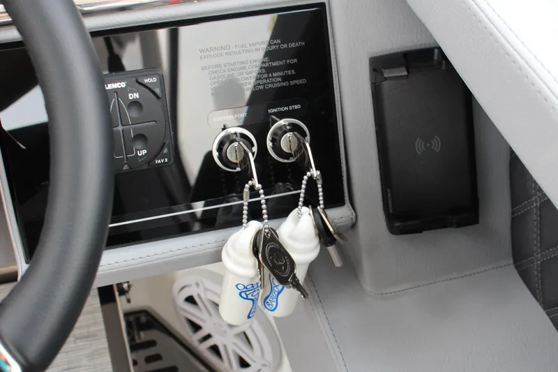 Slide: The Image of Dashboard of 2025 Cobalt R35 with ignition keys and control panel. - 31