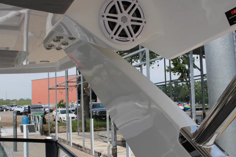 Slide: The Image of 2025 Cobalt R35 boat with sleek design, featuring a speaker and modern detailing. - 32