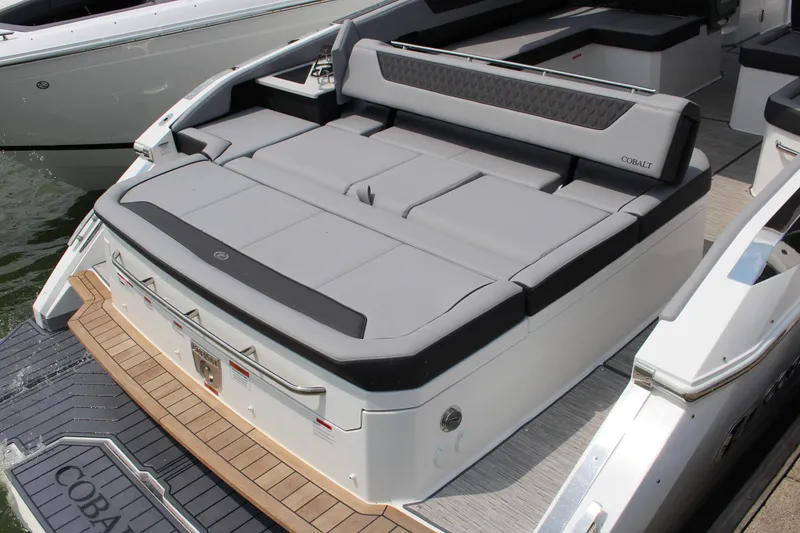 Slide: The Image of 2025 Cobalt R35 boat with luxurious gray seating and teak swim platform. - 36