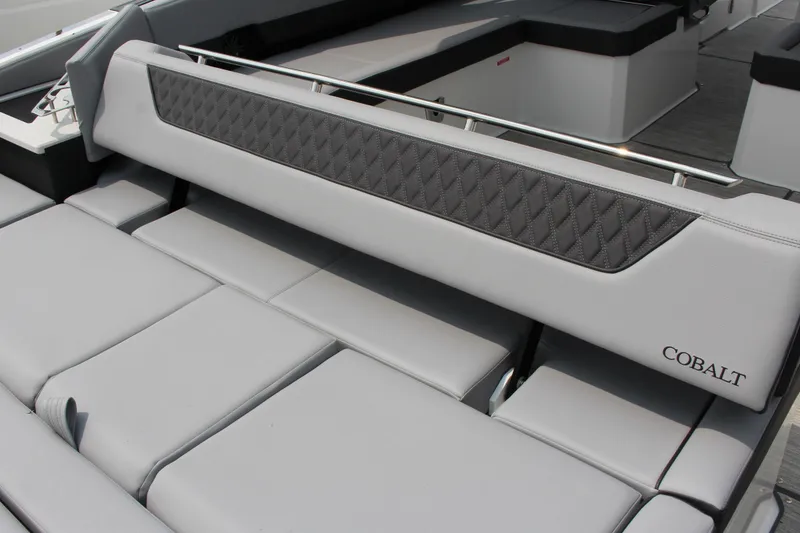 Slide: The Image of Luxurious seating on 2025 Cobalt R35 boat with diamond-patterned upholstery. - 38