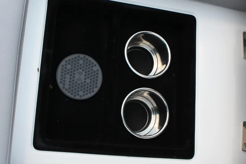 Slide: The Image of 2025 Cobalt R35 cup holders and wireless charging pad in sleek interior design. - 39