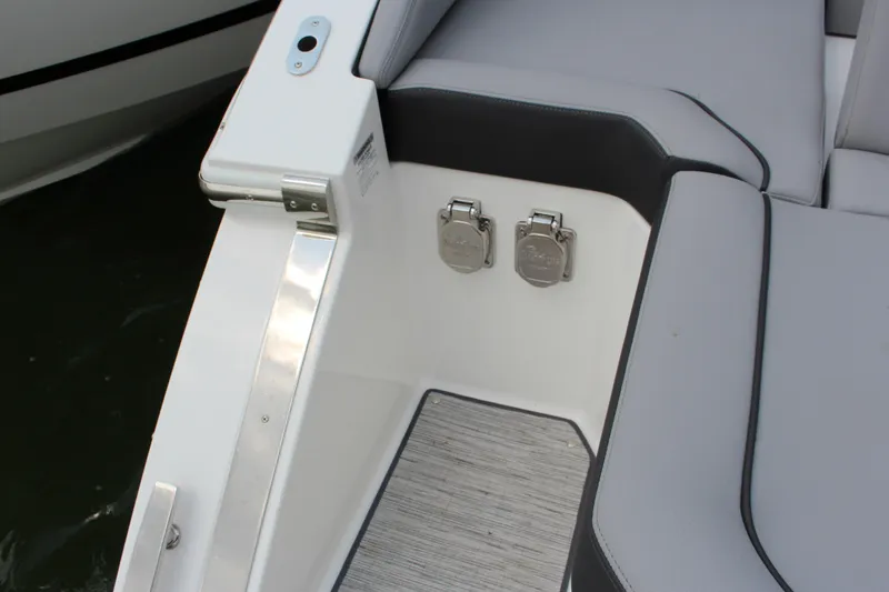 Slide: The Image of 2025 Cobalt R35 boat interior with sleek seating and stainless steel fixtures. - 40