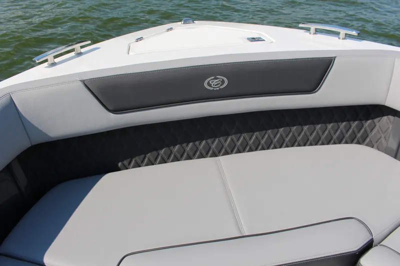 Slide: The Image of 2025 Cobalt R35 boat interior with luxurious seating and elegant design on the water. - 42