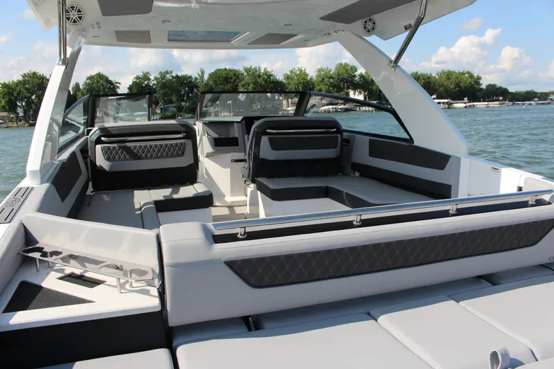 Slide: The Image of Luxurious interior of 2025 Cobalt R35 boat on a sunny lake. - 47
