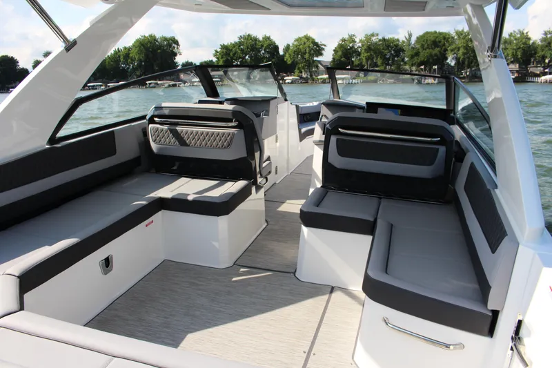 Slide: The Image of 2025 Cobalt R35 boat interior with sleek seating and modern design on a sunny day. - 48