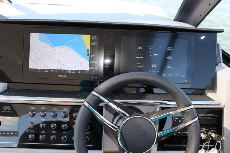 Slide: The Image of Dashboard of 2025 Cobalt R35 boat with navigation and control screens. - 51