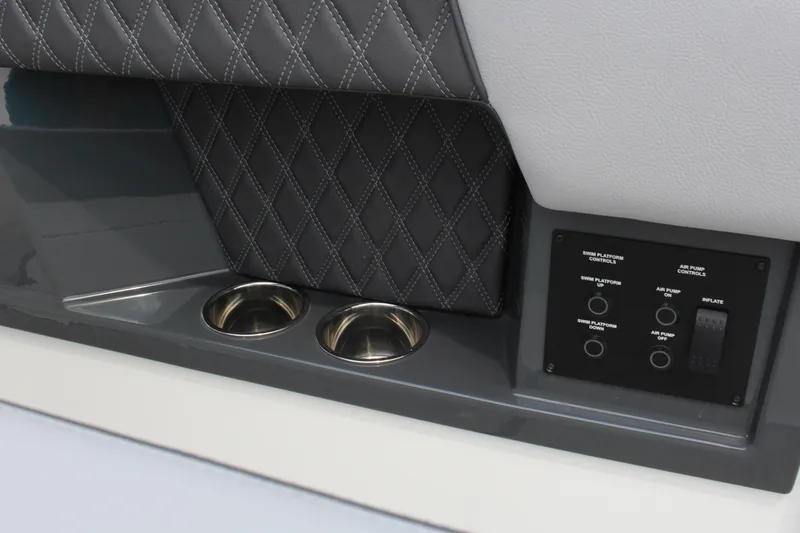 Slide: The Image of Interior of 2025 Cobalt R35 featuring cup holders and control panel. - 6