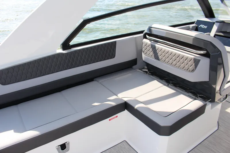 Slide: The Image of Luxurious seating area on the 2025 Cobalt R35 boat, featuring modern design and comfort. - 65