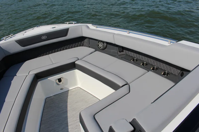 Slide: The Image of Luxurious seating area on 2025 Cobalt R35 boat, featuring sleek gray upholstery. - 69