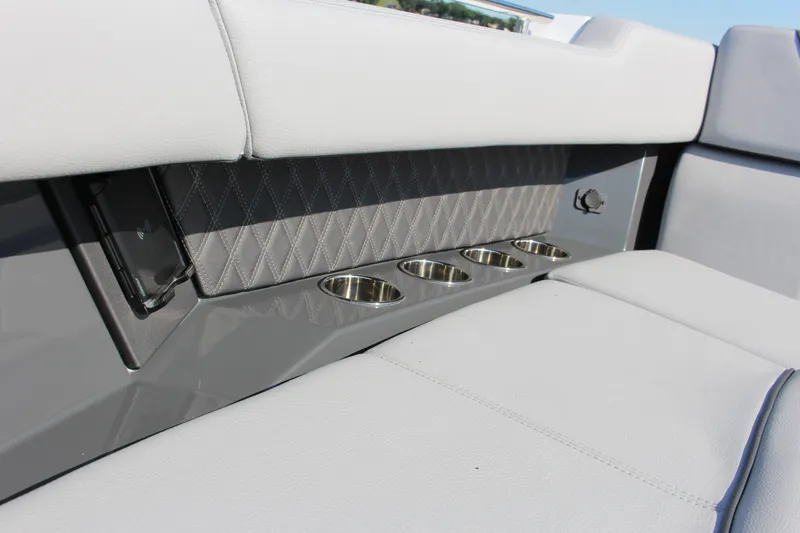 Slide: The Image of Luxurious interior of 2025 Cobalt R35 with cup holders and quilted upholstery. - 86