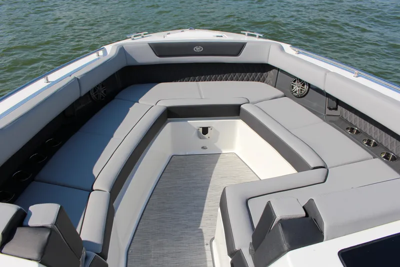 Slide: The Image of Luxurious seating area on 2025 Cobalt R35 boat, featuring sleek gray upholstery and modern design. - 88