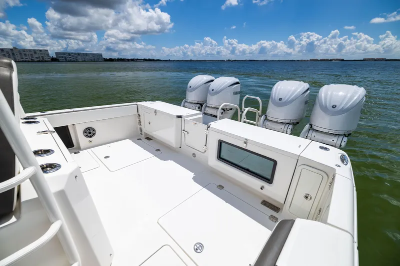 Slide: The Image of 2022 World Cat 400 CC-X boat with four engines on a sunny day. - 20