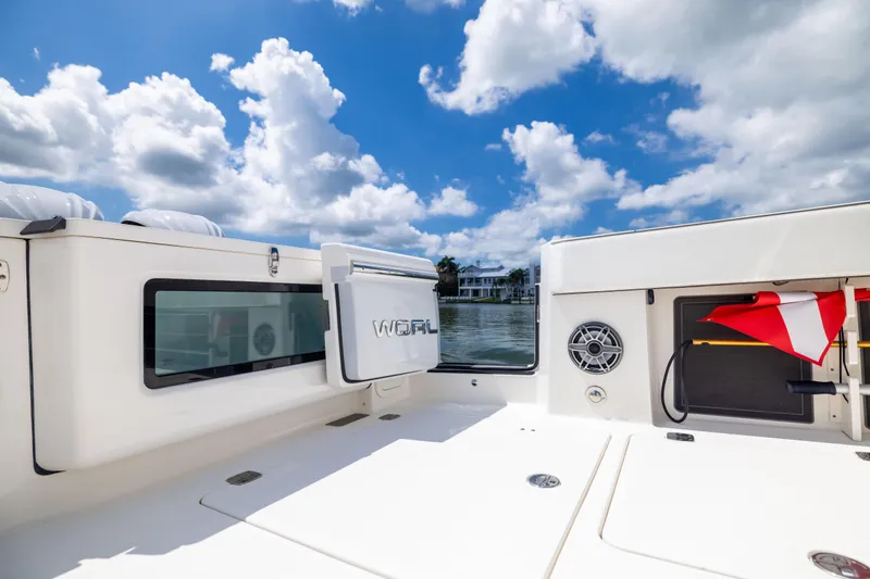 Slide: The Image of 2022 World Cat 400 CC-X boat deck with clear sky and water view. - 32