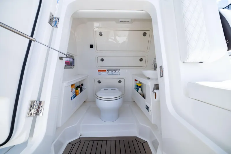 Slide: The Image of Interior of 2022 World Cat 400 CC-X boat bathroom with modern amenities. - 59