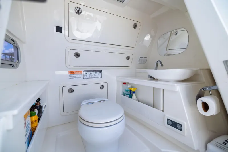 Slide: The Image of Luxurious 2022 World Cat 400 CC-X boat bathroom with modern amenities and sleek design. - 60