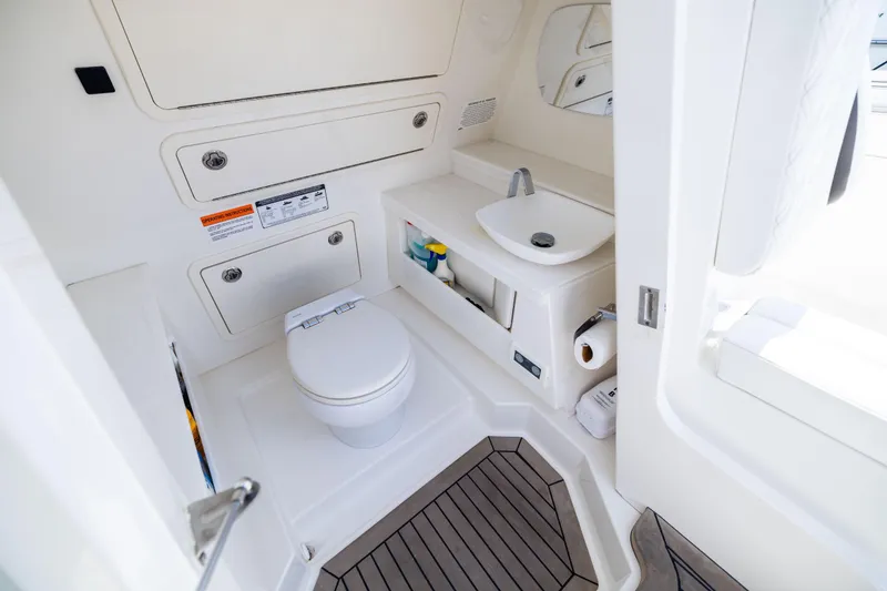 Slide: The Image of Luxurious 2022 World Cat 400 CC-X boat bathroom with modern amenities and sleek design. - 61