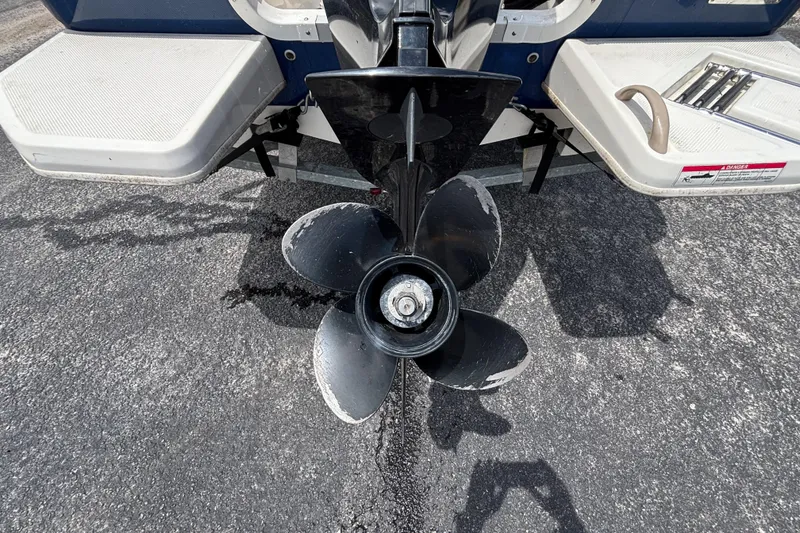 Slide: The Image of 2018 Bayliner Element E16 boat propeller on asphalt surface. - 14