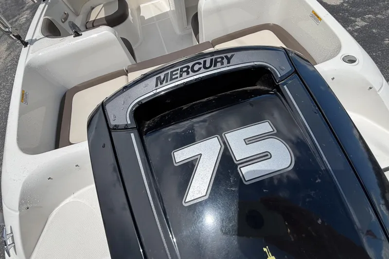 Slide: The Image of 2018 Bayliner Element E16 boat with Mercury 75 engine, interior seating view. - 17