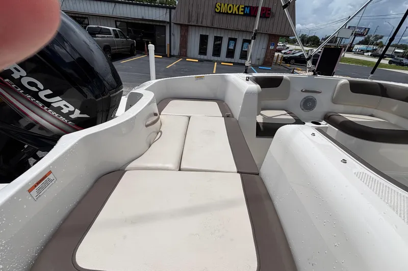 Slide: The Image of 2018 Bayliner Element E16 boat interior with seating and Mercury engine. - 19