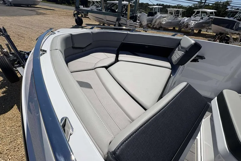 Slide: The Image of 2026 Monterey 27 Elite boat interior with sleek, modern seating and luxurious design. - 21