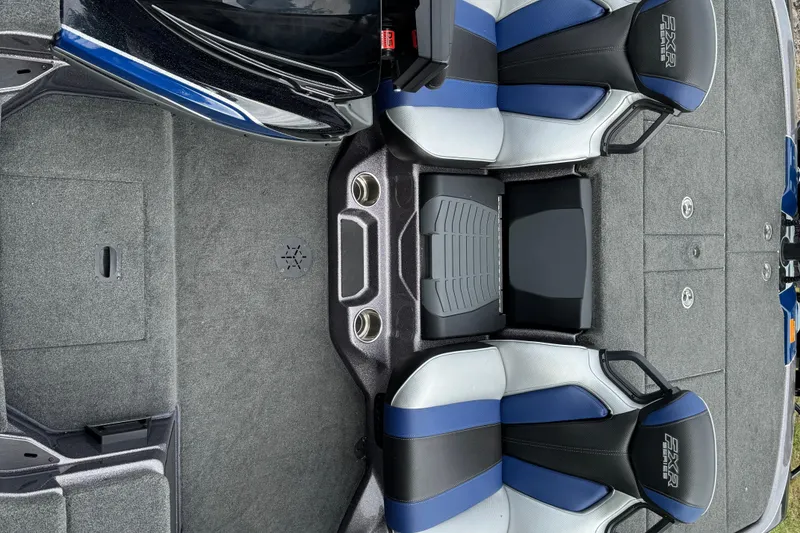 Slide: The Image of 2021 Skeeter FXR21 Apex boat capacity and safety labels with speaker detail. - 12