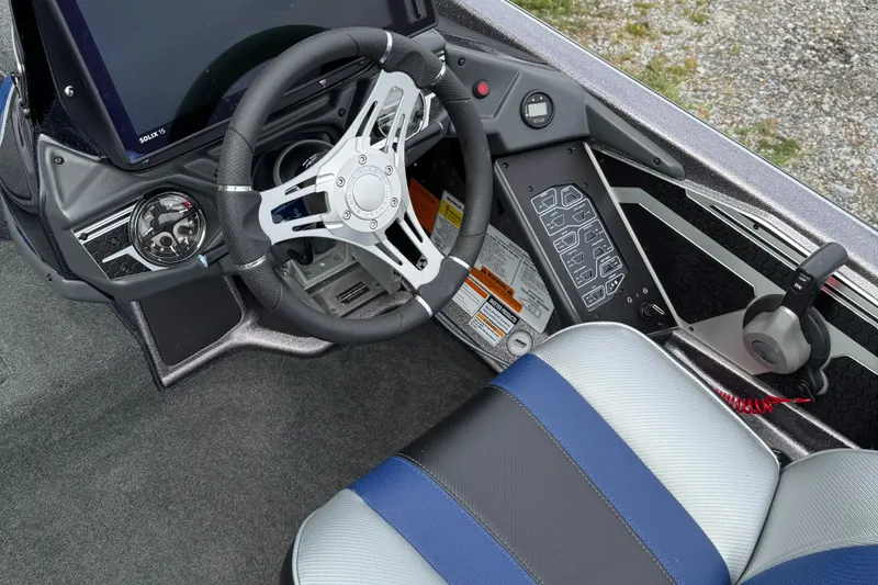 Slide: The Image of 2021 Skeeter FXR21 Apex boat interior with dual seats and control panel. - 5