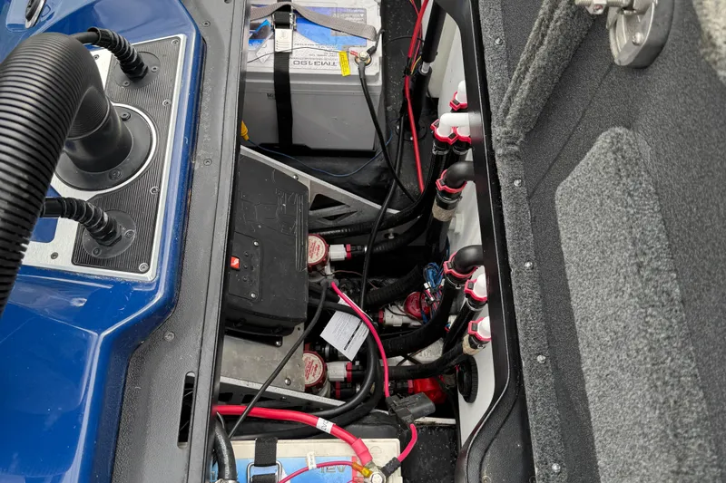 Slide: The Image of Minn Kota Ultrex motor on 2021 Skeeter FXR21 Apex boat, outdoor setting. - 9