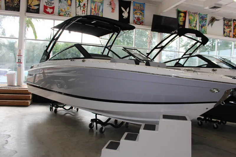 The Image of 2025 Cobalt R4 boat displayed indoors with sleek design and modern features. - 0