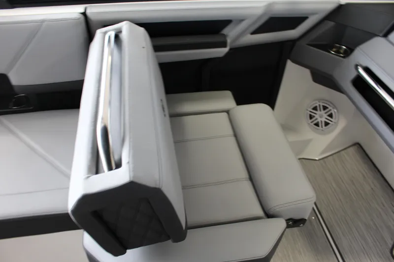 Slide: The Image of 2025 Cobalt R4 boat interior with sleek gray seating and modern design elements. - 11