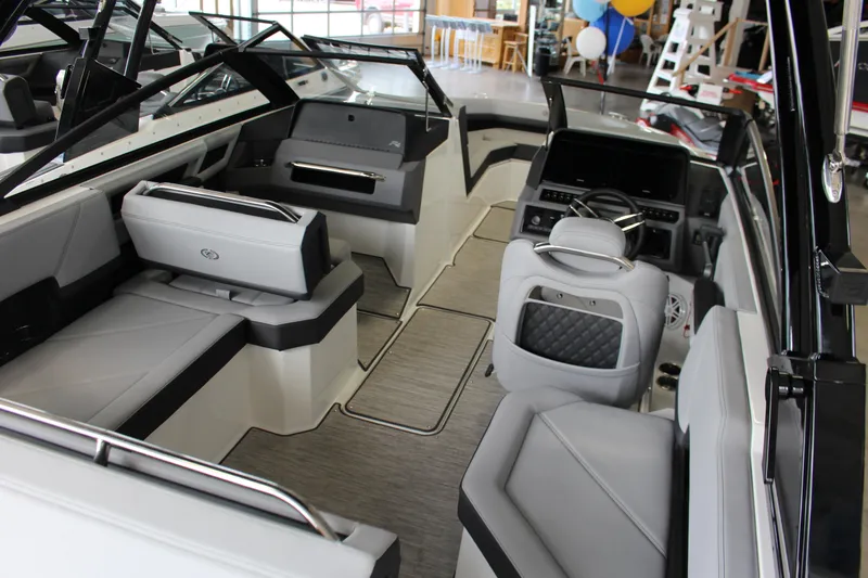 Slide: The Image of Interior of 2025 Cobalt R4 boat with modern seating and sleek dashboard design. - 3
