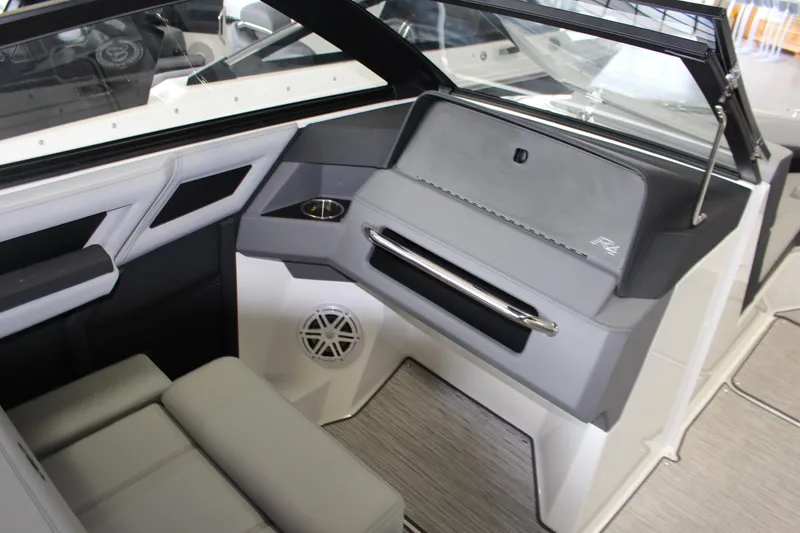 Slide: The Image of Interior of 2025 Cobalt R4 boat, featuring sleek seating and modern dashboard design. - 9