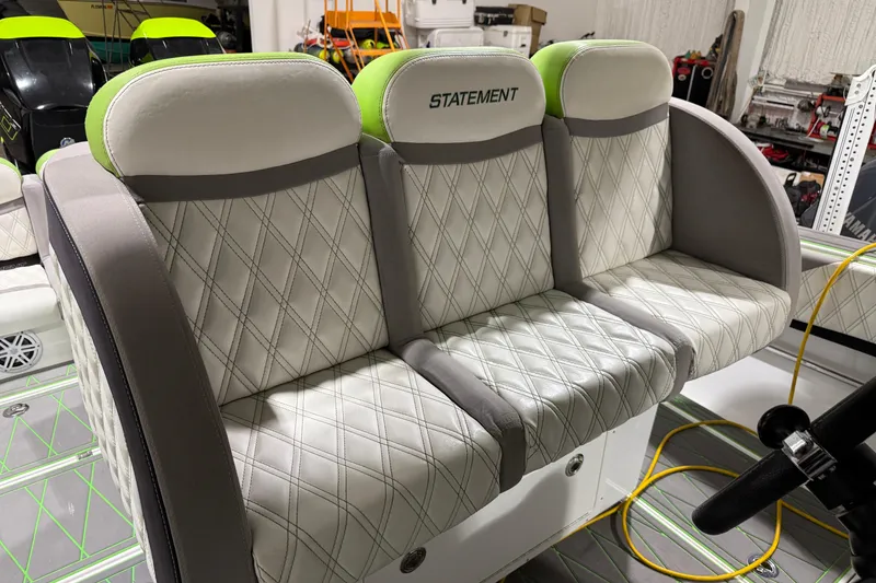 Slide: The Image of Luxurious seating on 2017 Statement 350 Open boat with diamond-stitched upholstery. - 17